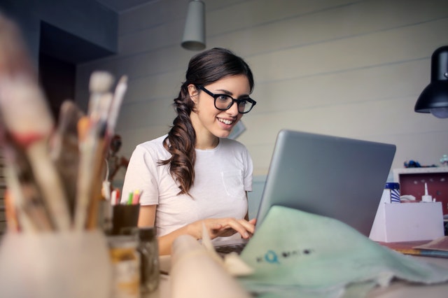Social Media Virtual Assistant busy in her laptop with her tasks